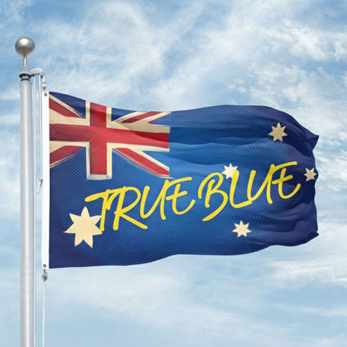 Australian flag with 'True Blue' text against a blue sky